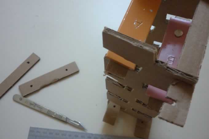 Eames Musical Tower Cardboard Prototype with test bars and scalpel