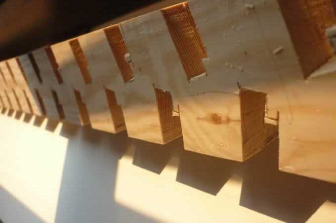 Modern Musical Tower Wooden Slots Modern Musical Tower Wooden Slots after removing waste material with chisel