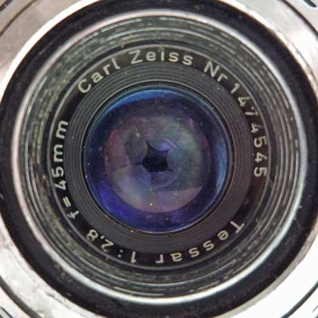 Close up photo of a Zeiss Contaflex lens showing shutter blades